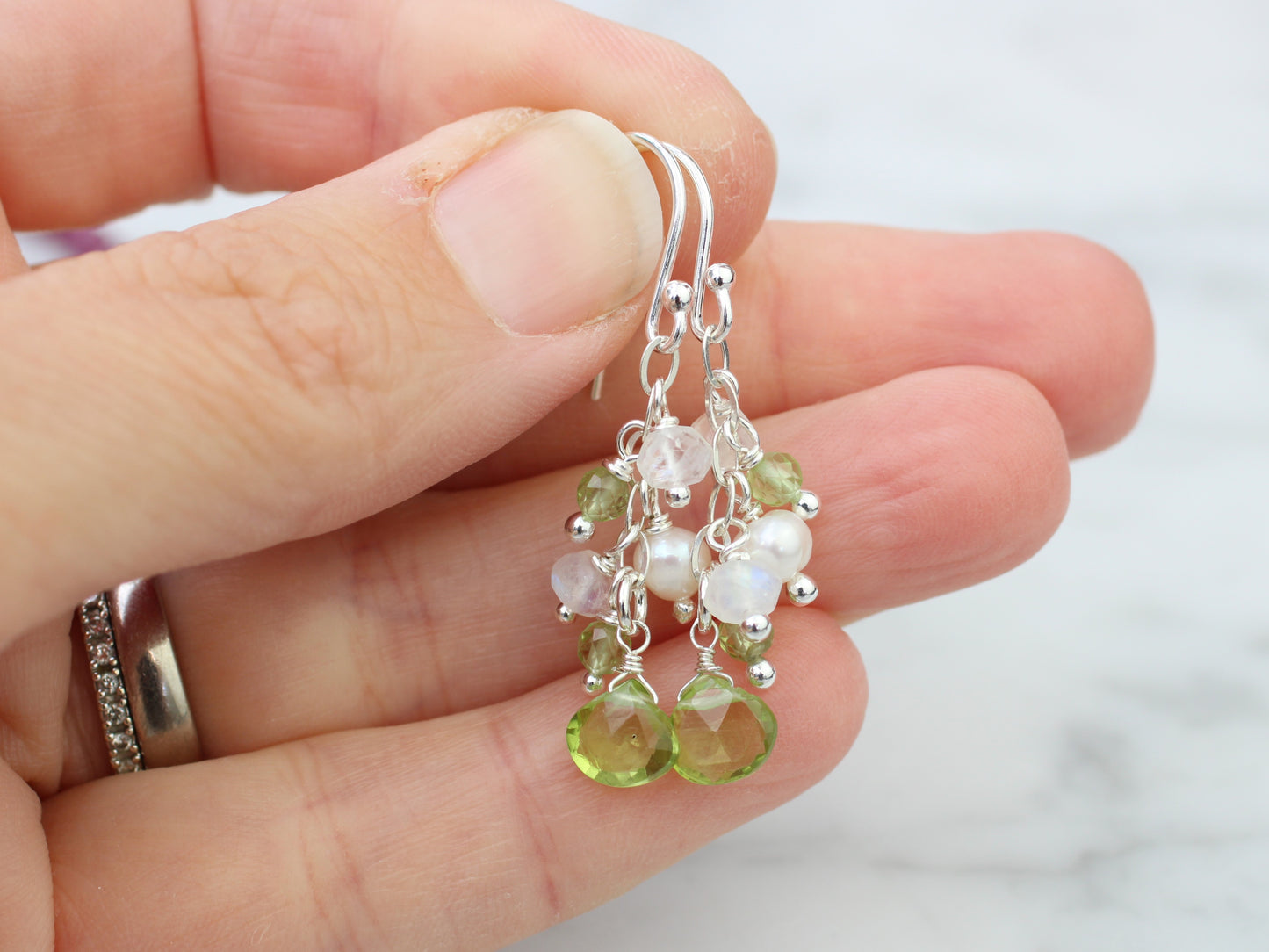 Peridot, moonstone and pearl cluster earrings.