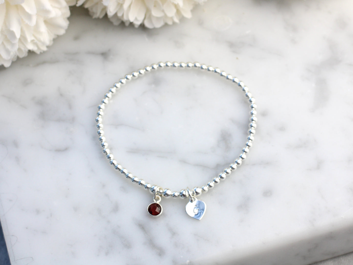 Garnet charm and initial bracelet. January birthstone.