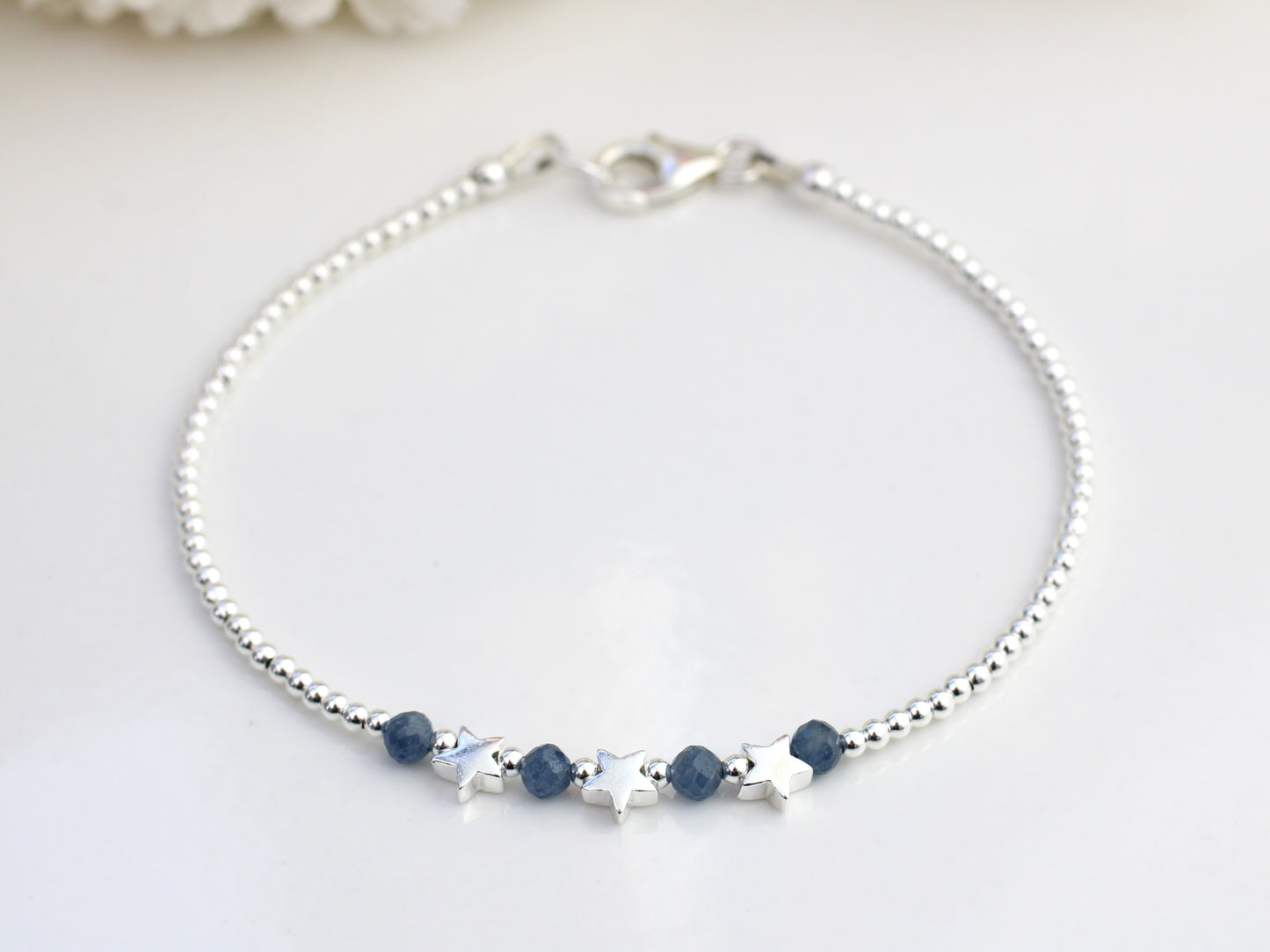 Star bracelet with sapphire gemstones. September birthstone.