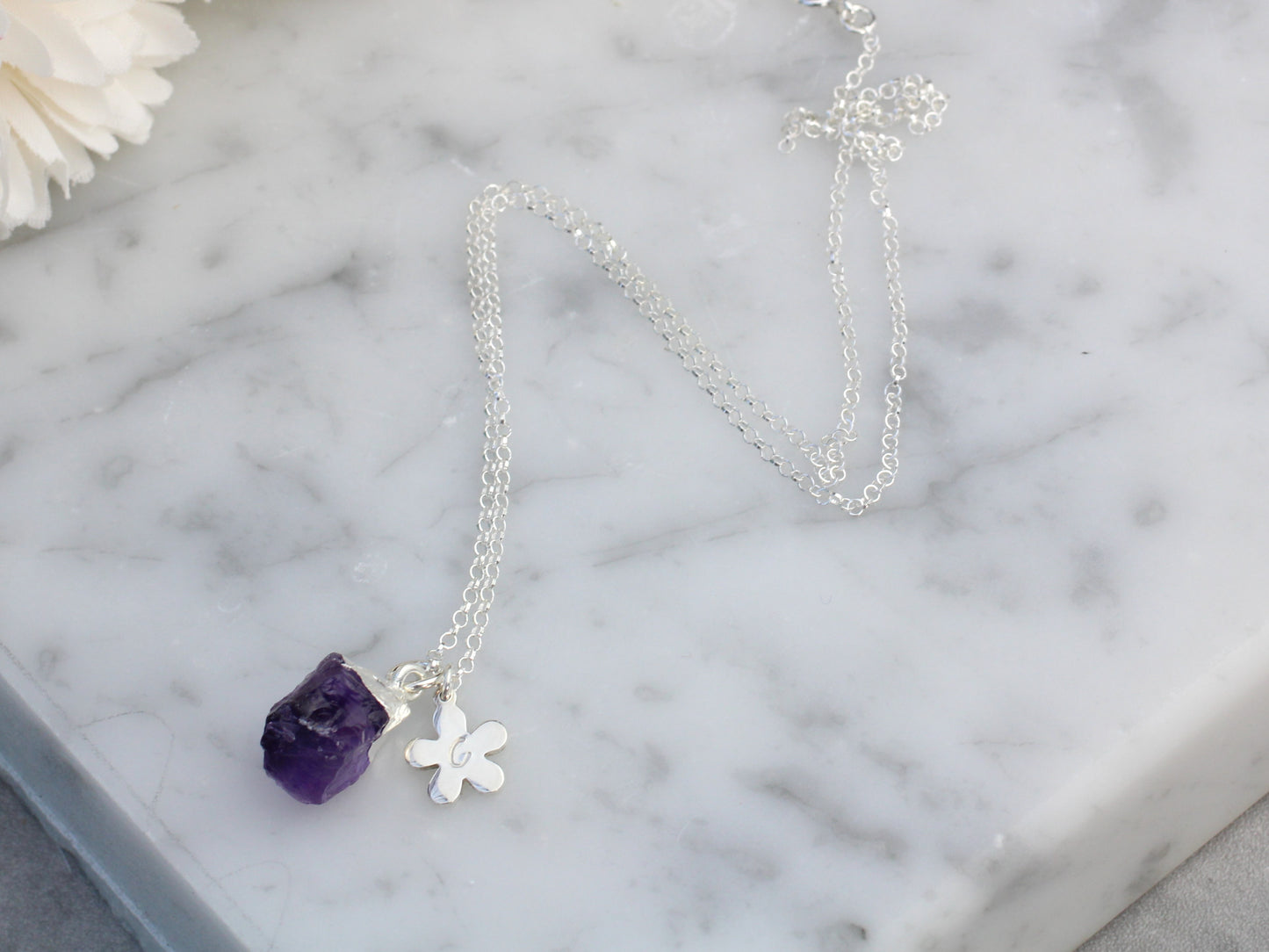 Amethyst initial necklace in sterling silver.