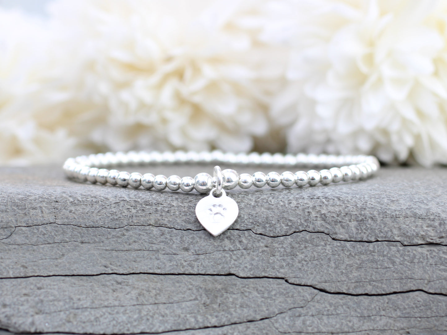 Paw bracelet in silver. Dog remembrance gift.