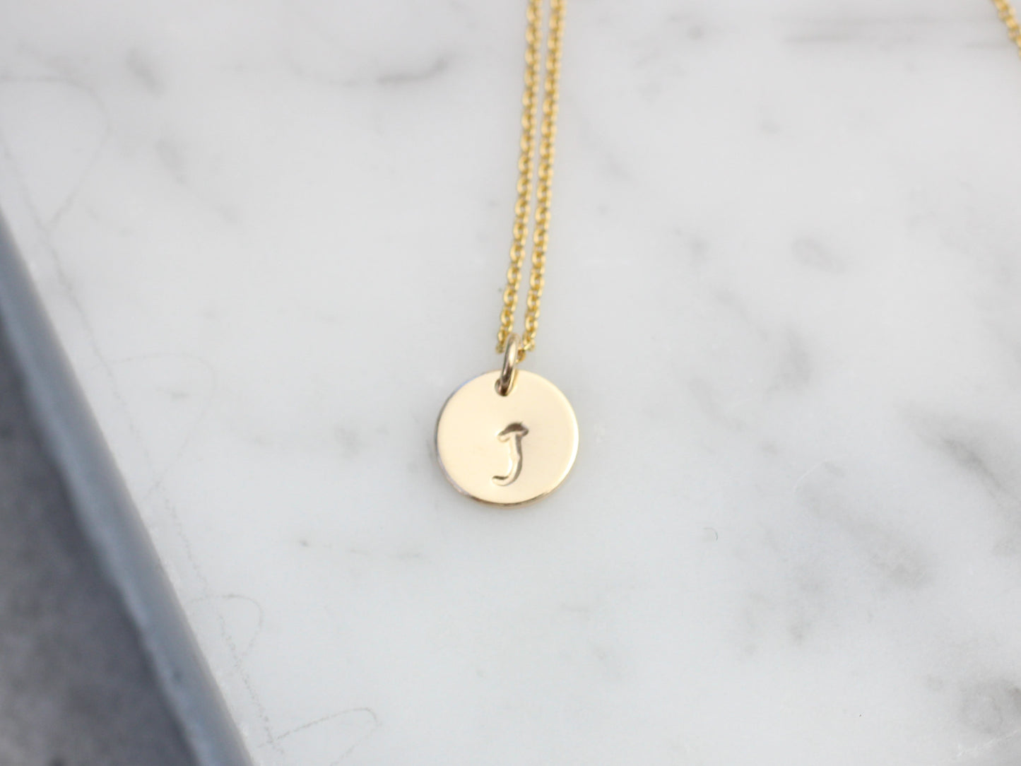 Family initial necklace.