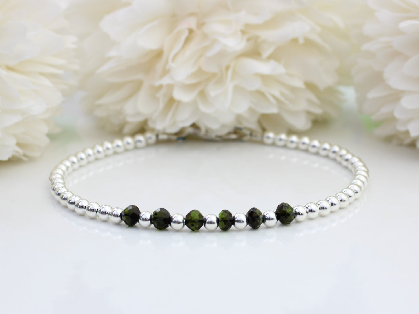 Black tourmaline milestone bracelet in sterling silver.