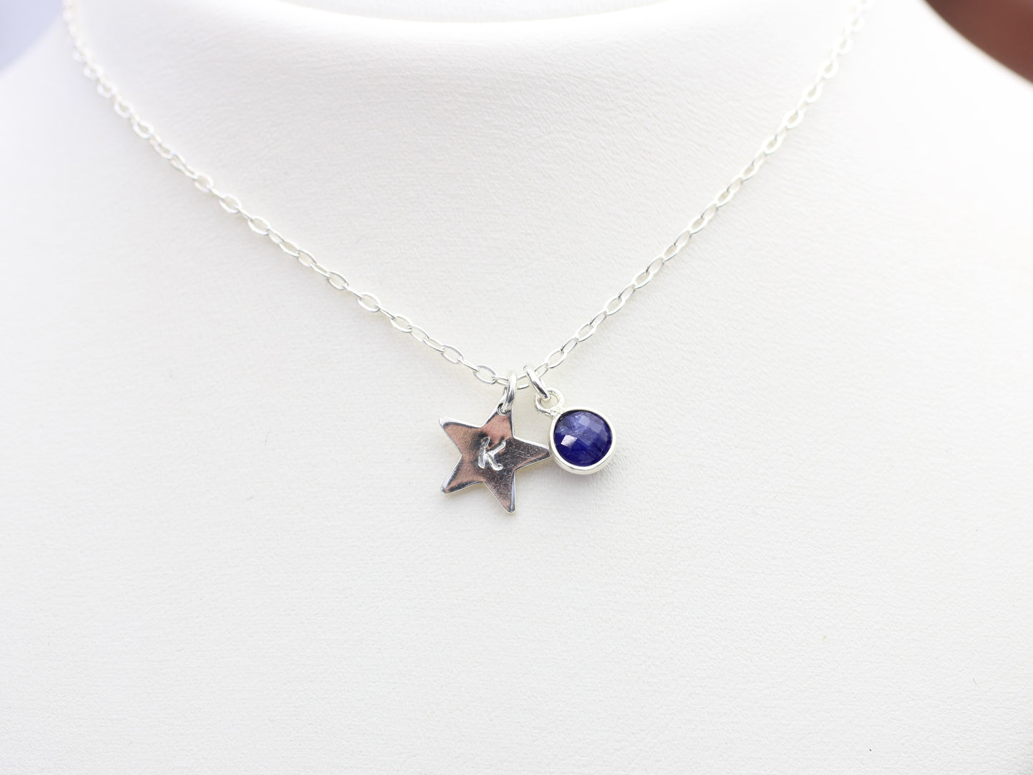 Star initial necklace with optional birthstone.