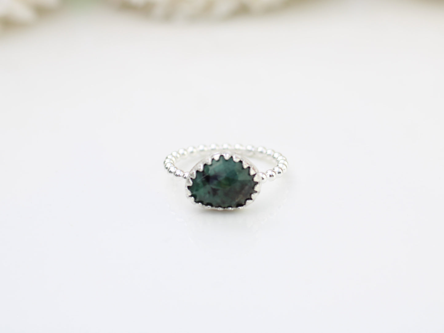 Natural emerald gemstone ring.