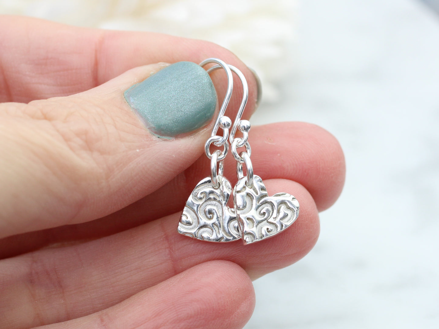 Heart drop earrings.