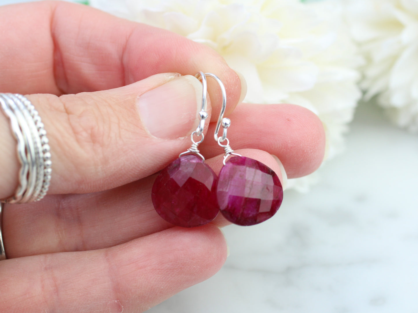 Ruby drop earrings in silver or gold. July birthstone.