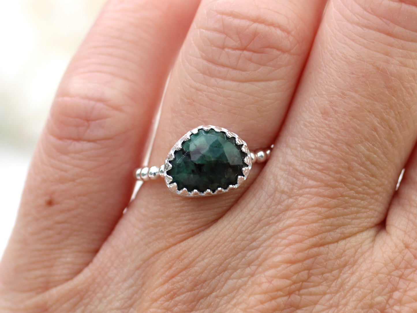 Natural emerald gemstone ring.