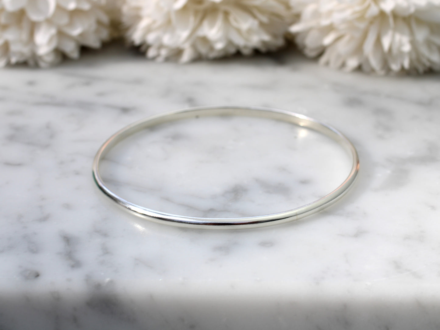 Classic sterling silver bangle.