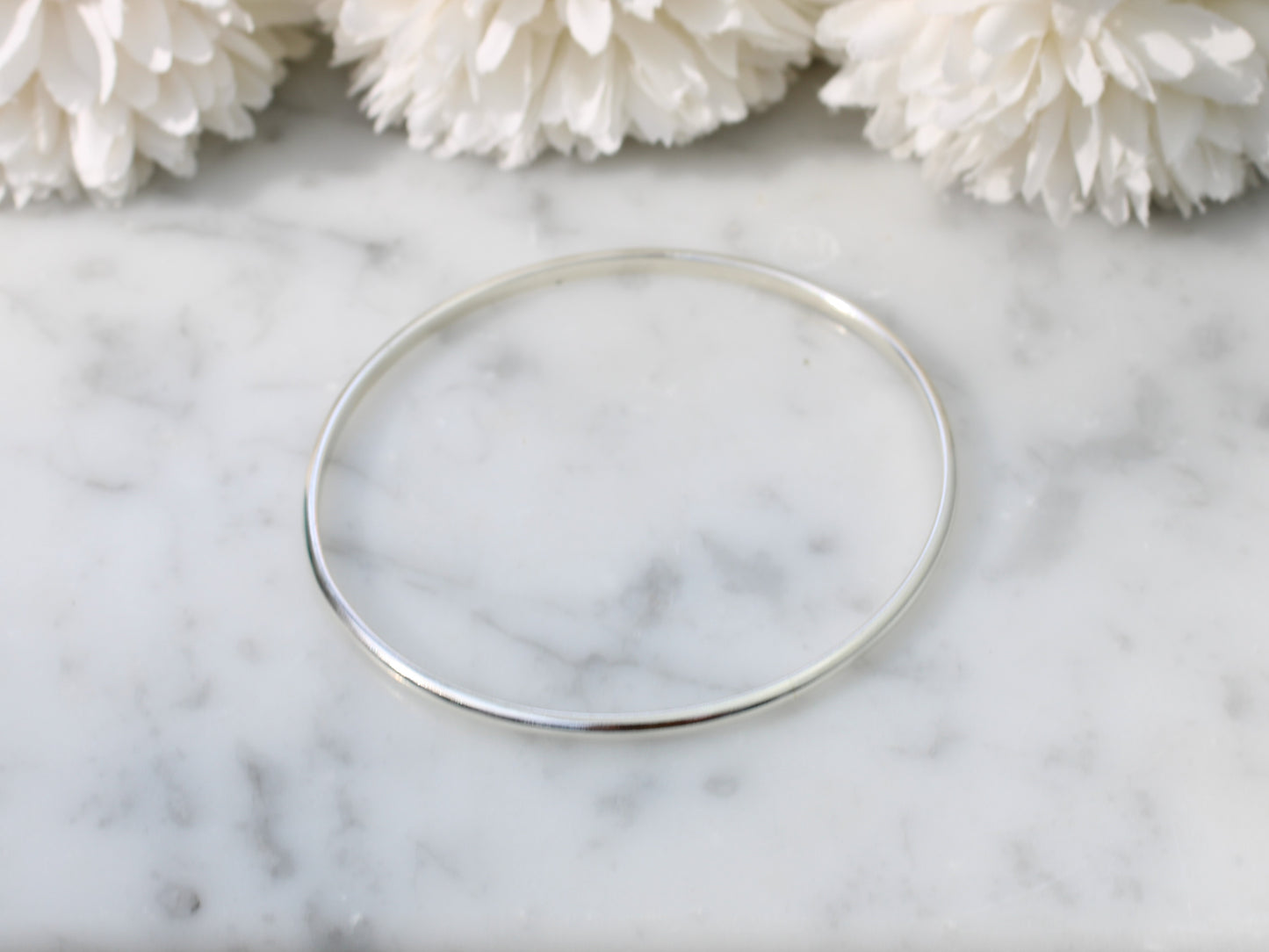 Classic sterling silver bangle.