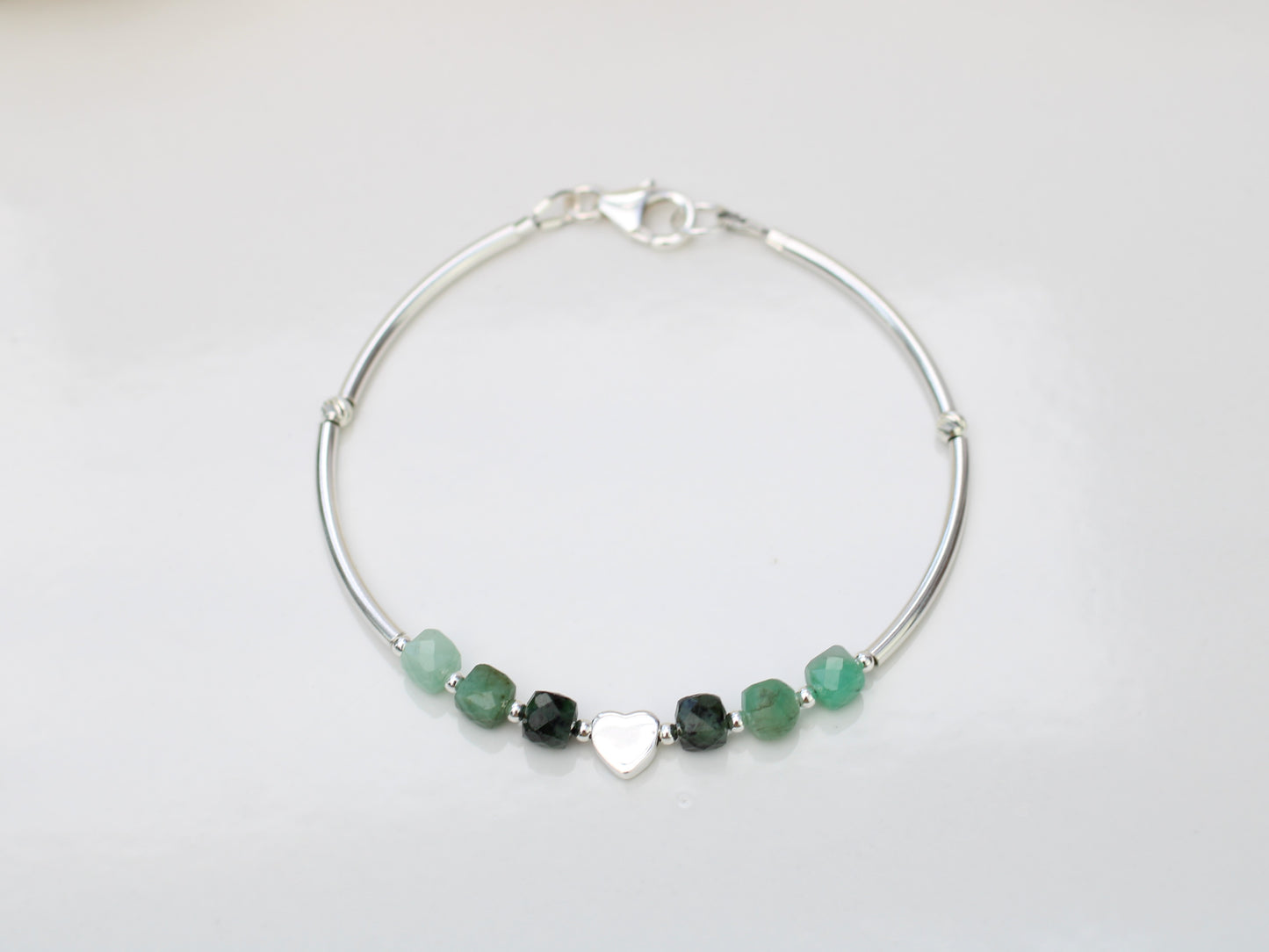 Personalised emerald bracelet in sterling silver.