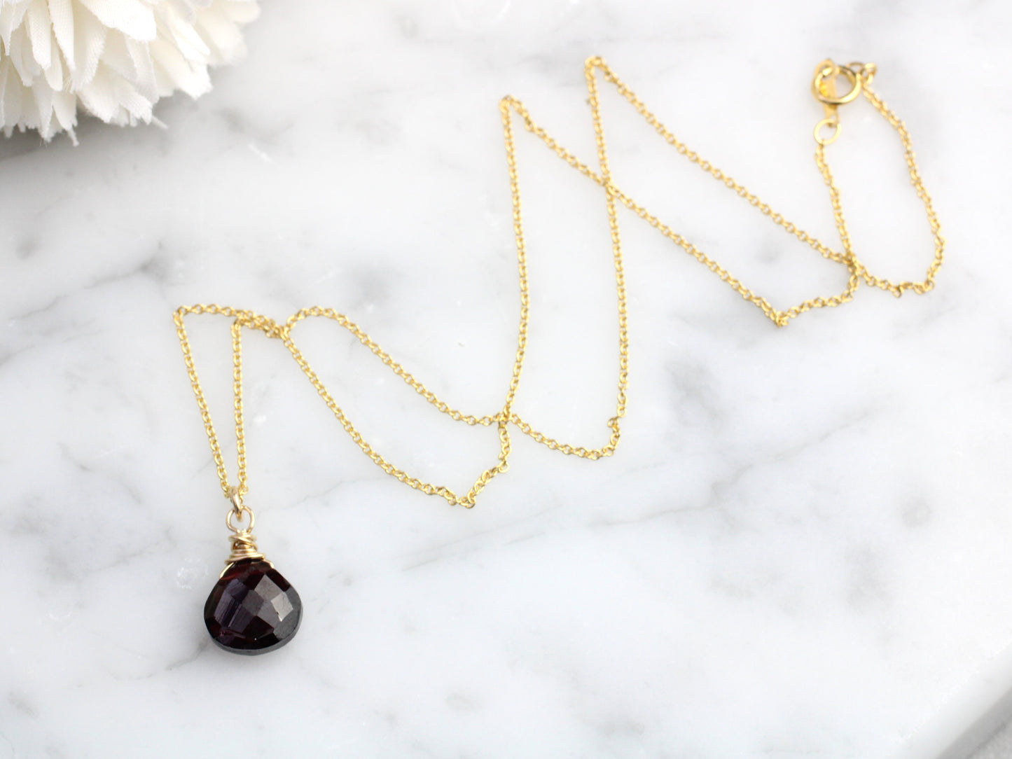 Garnet necklace in sterling silver or gold.