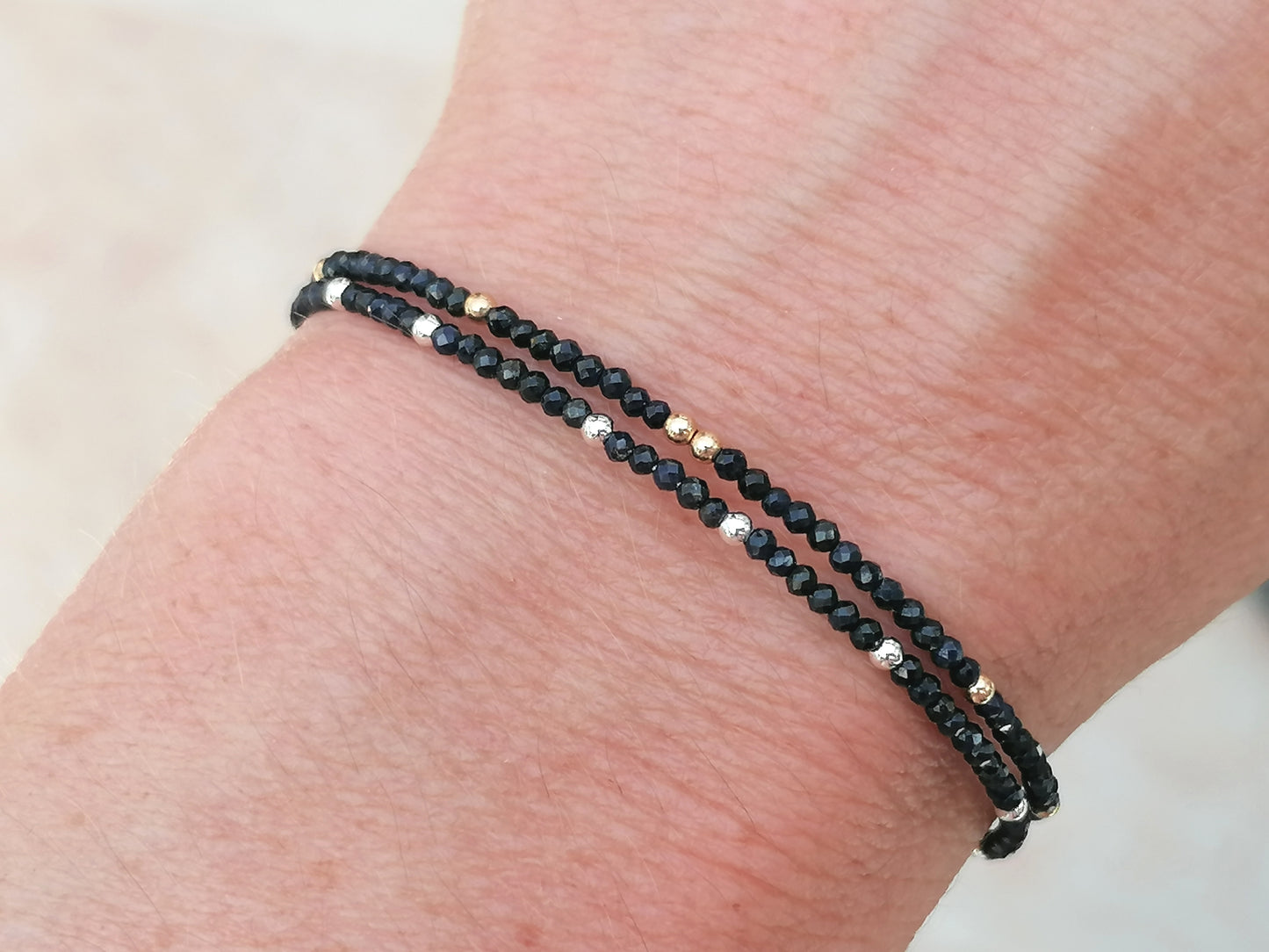 Skinny sapphire bracelet in sterling silver or gold.