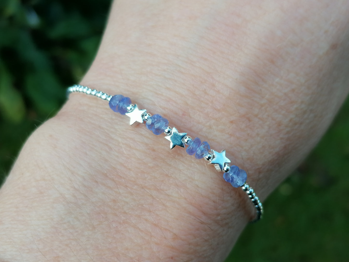 Star bracelet with tanzanite gemstones.