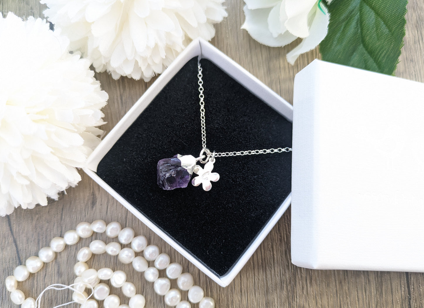 Amethyst initial necklace in sterling silver.