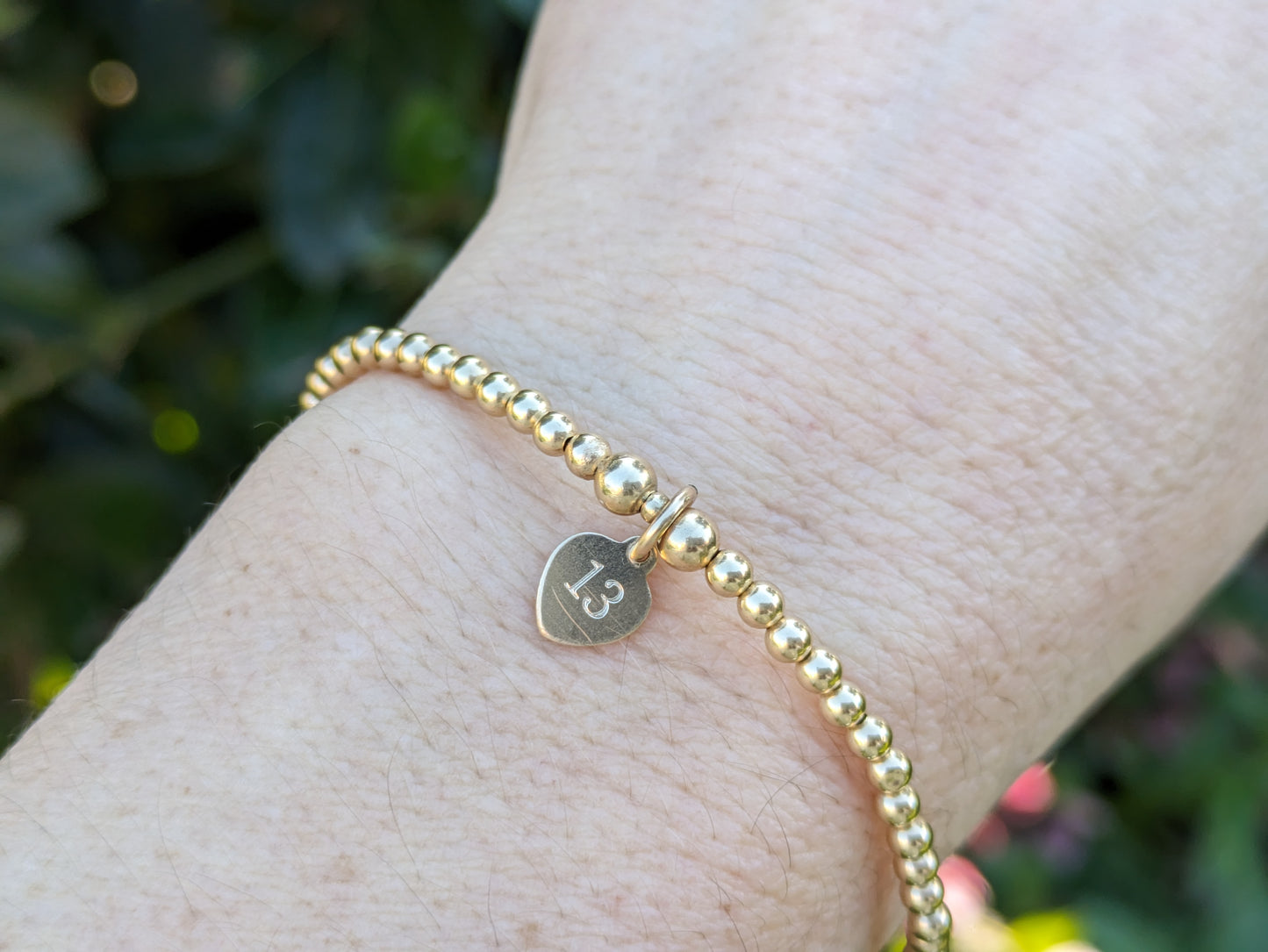 13th birthday bracelet in gold.