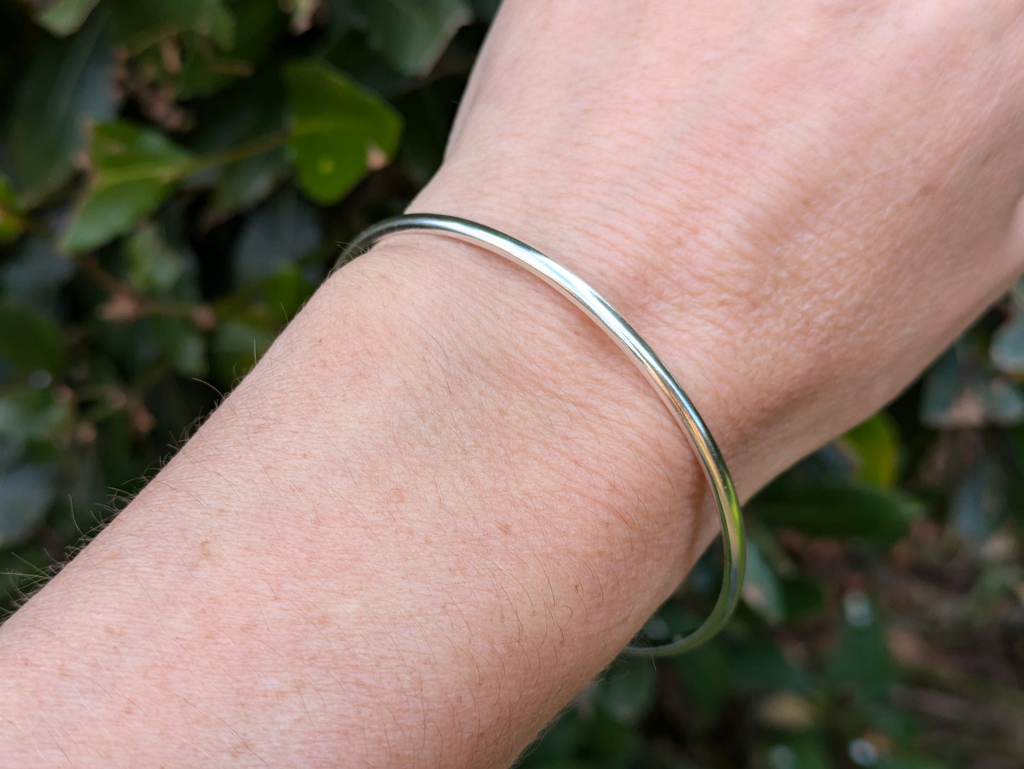 Classic sterling silver bangle.