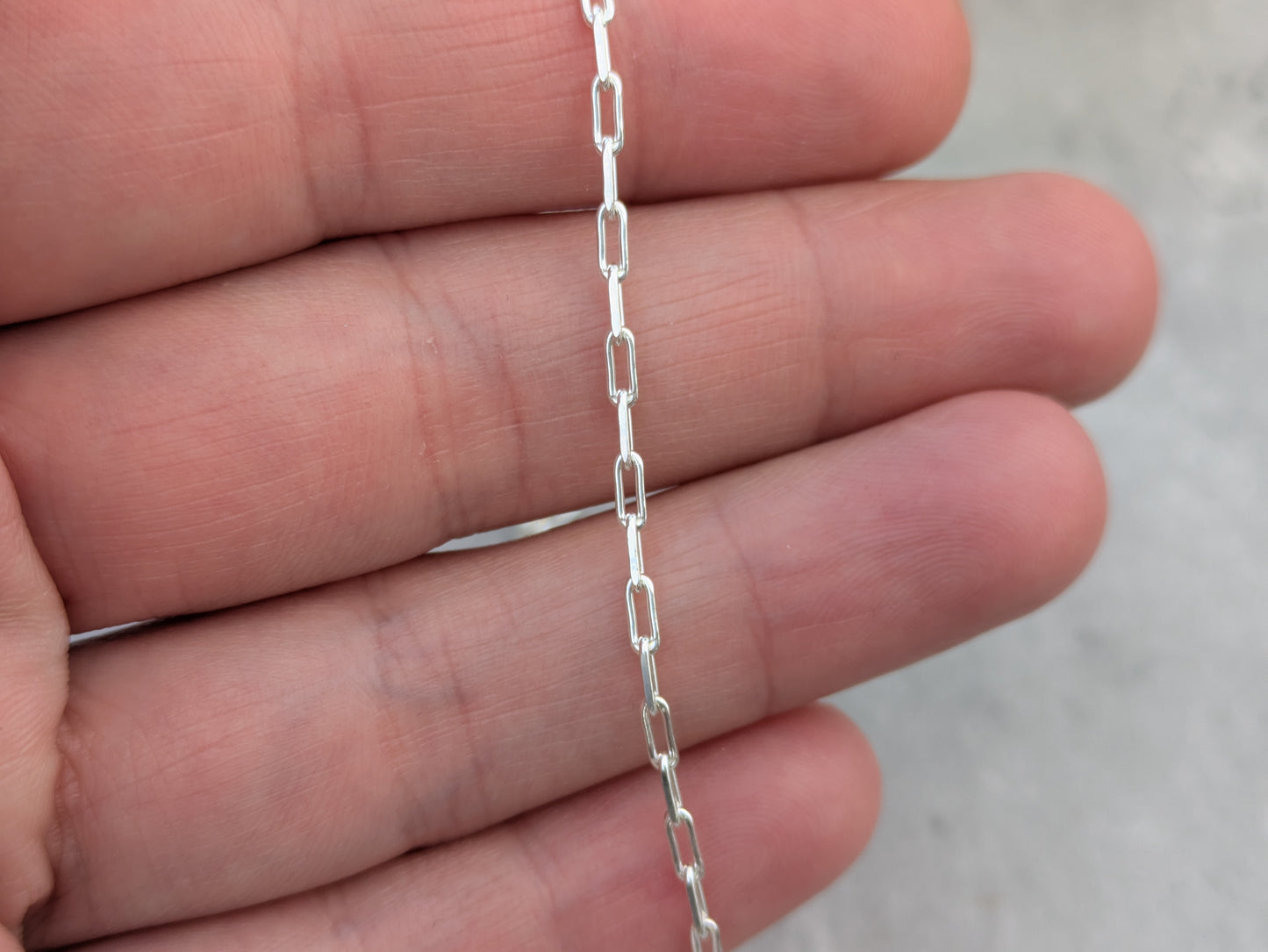 Sterling silver small paperclip chain necklace.