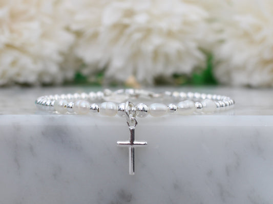 cross charm bracelet with freshwater pearls