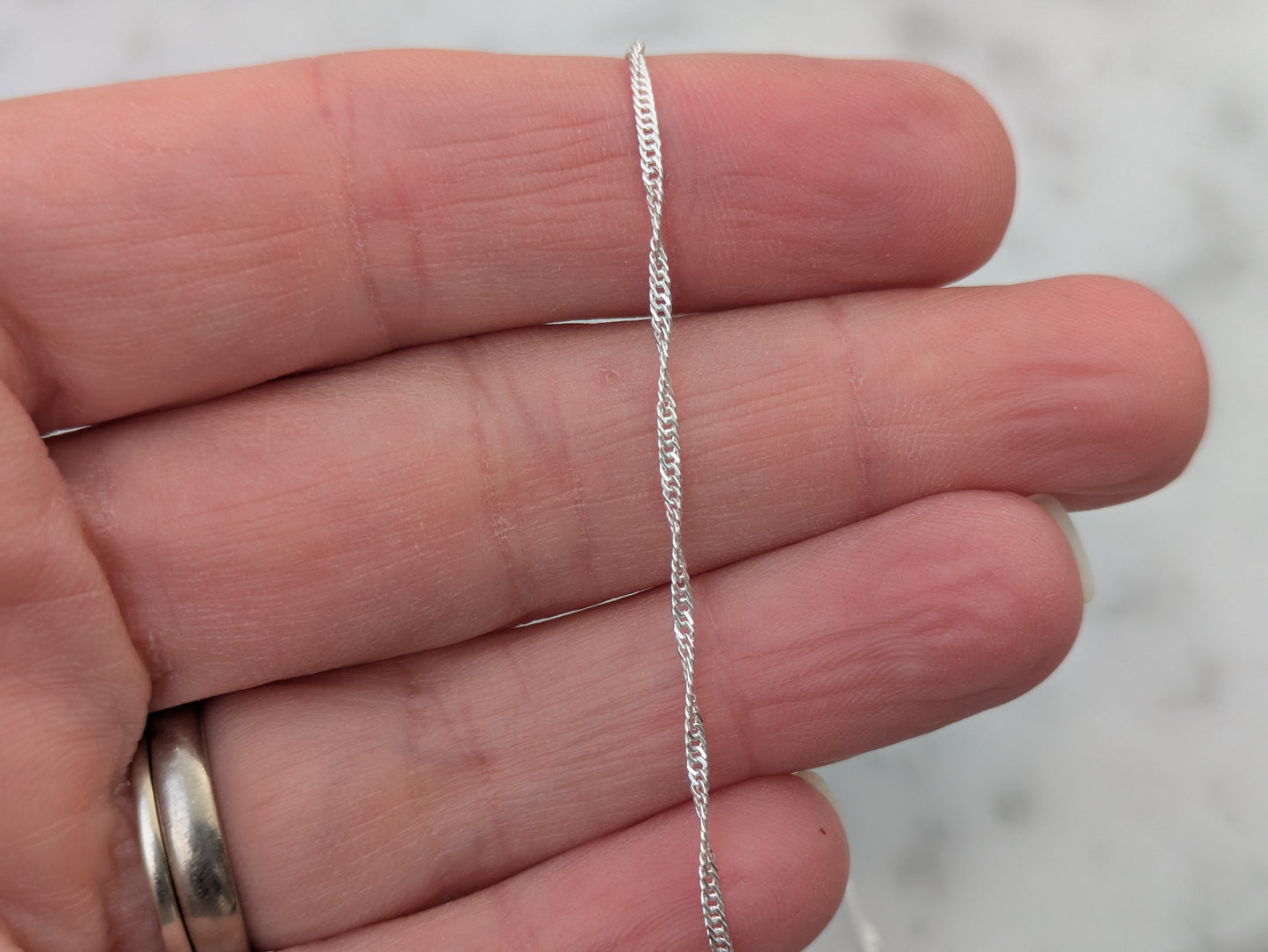 Sterling silver twisted curb necklace chain.