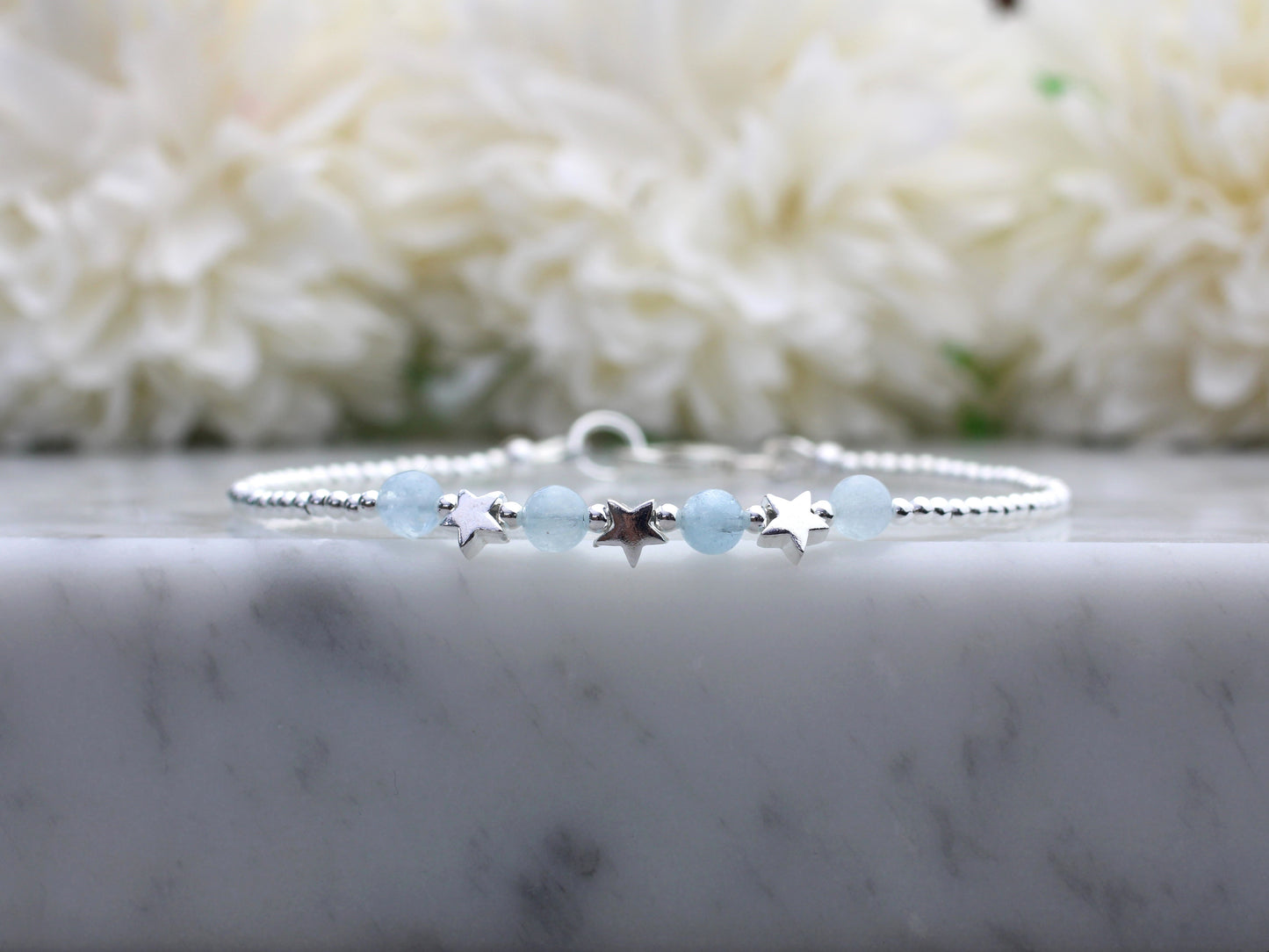 star bracelet with aquamarine gemstones