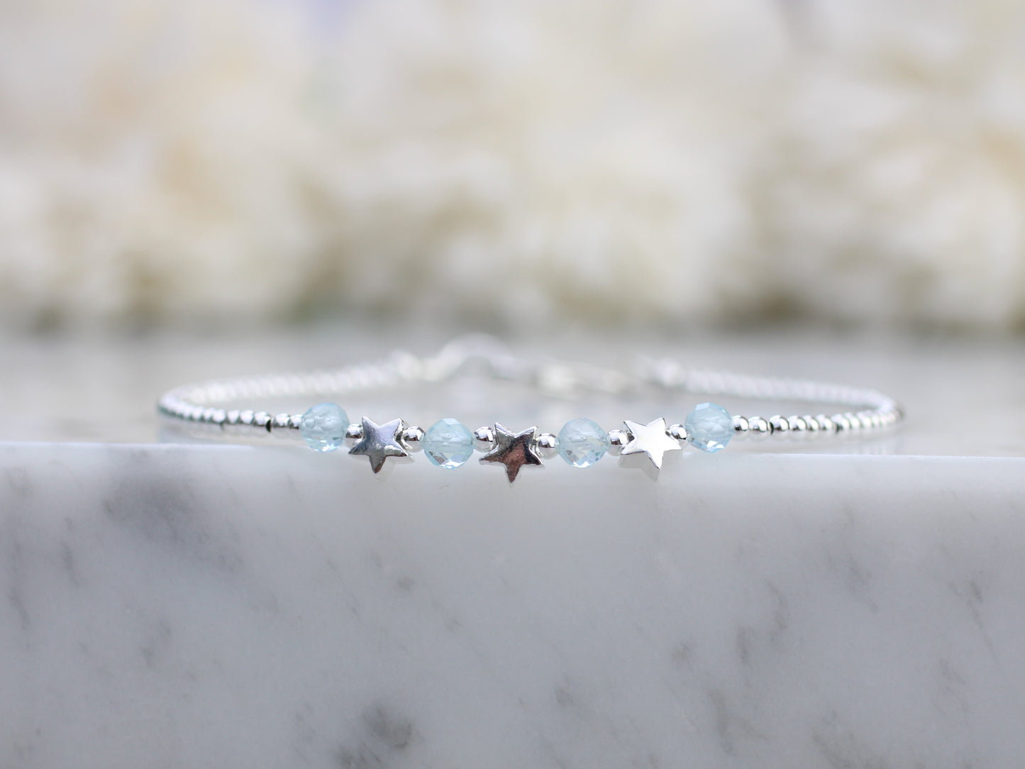 star bracelet with blue topaz gemstones