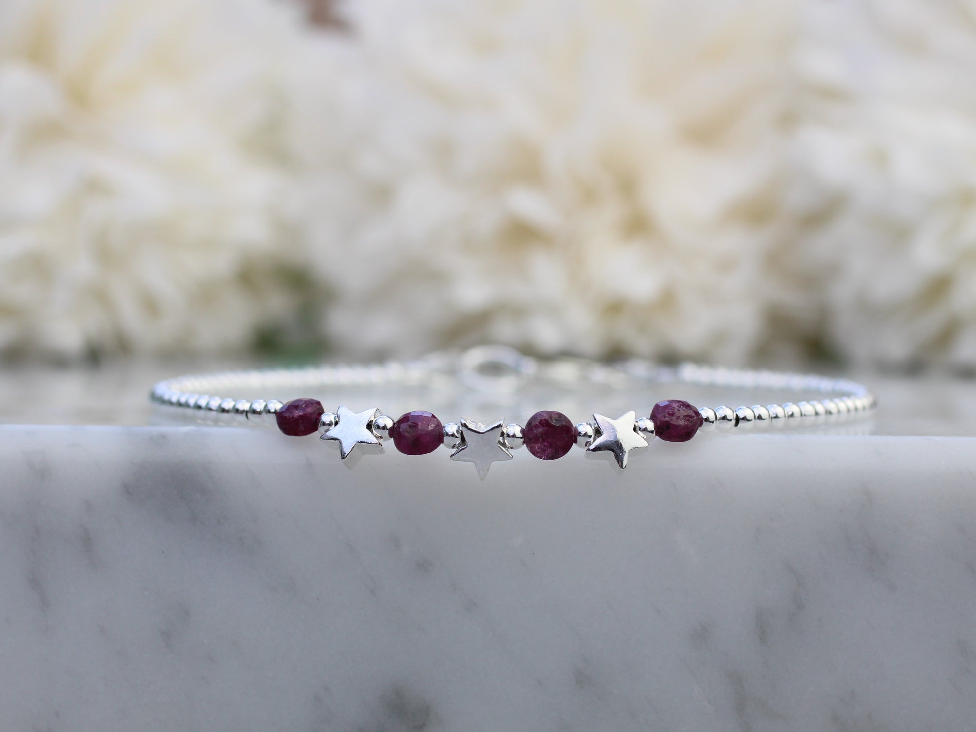 star bracelet with ruby gemstones