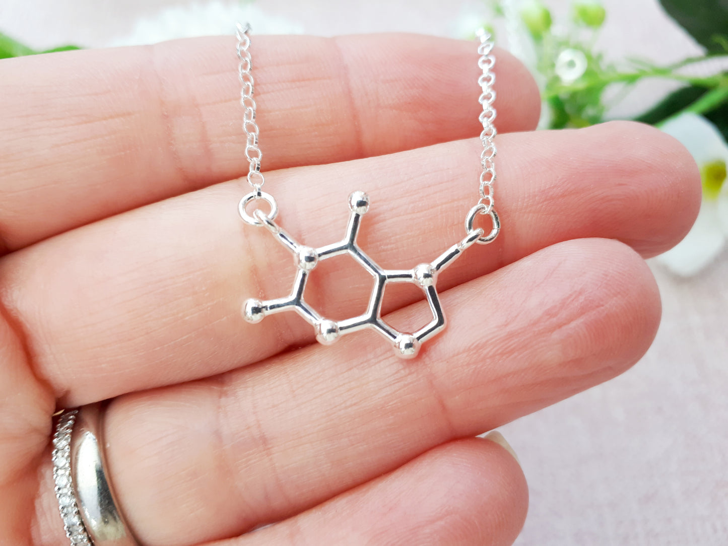Chocolate molecule necklace in sterling silver. Can be personalised.