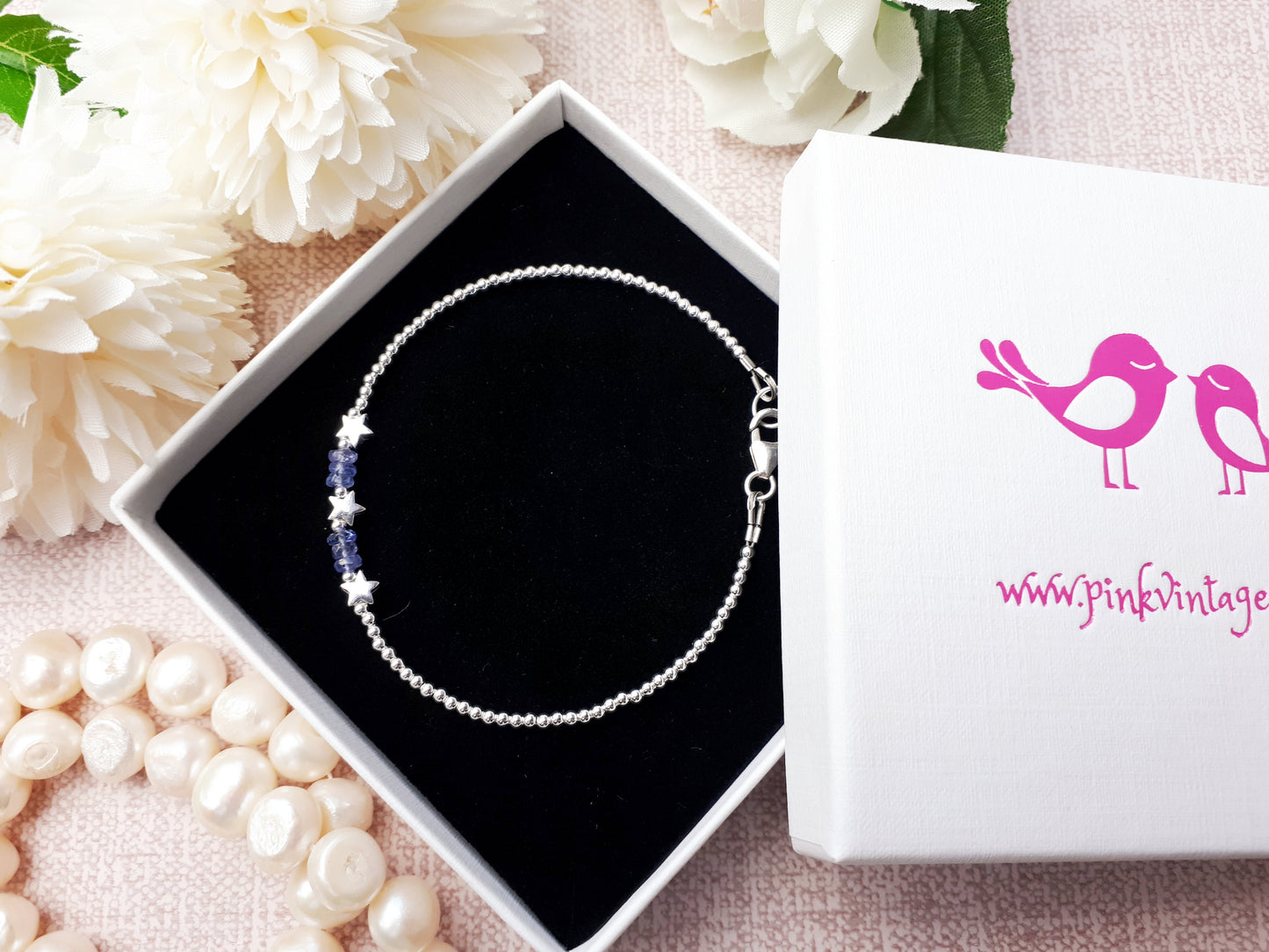 Star bracelet with tanzanite gemstones.