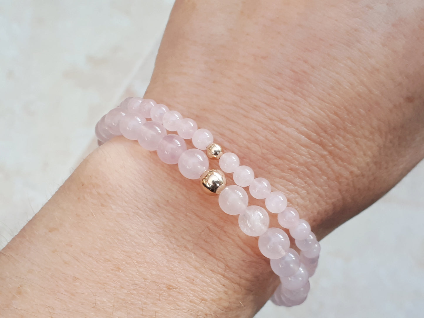 Rose quartz bead bracelet.