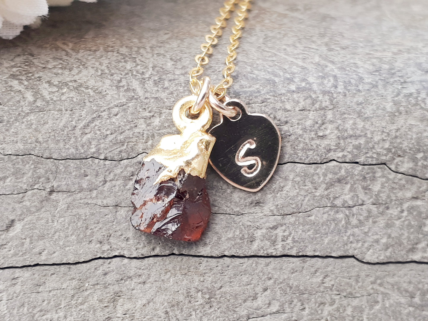 Personalised raw garnet gemstone necklace in gold.