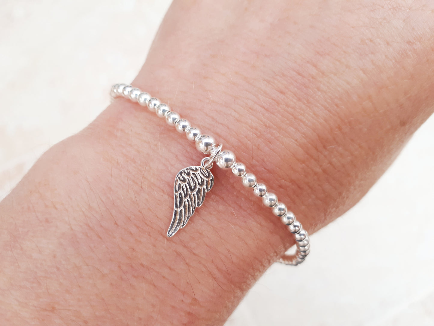 Angel wing bracelet.