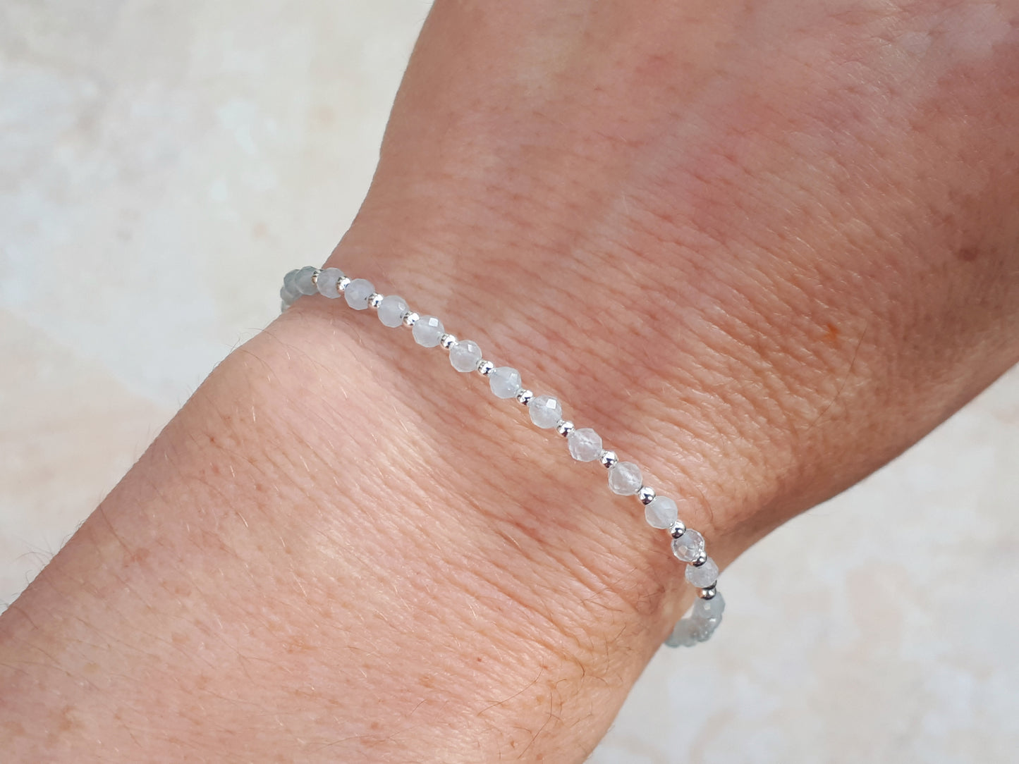 March birthstone bracelet in silver.