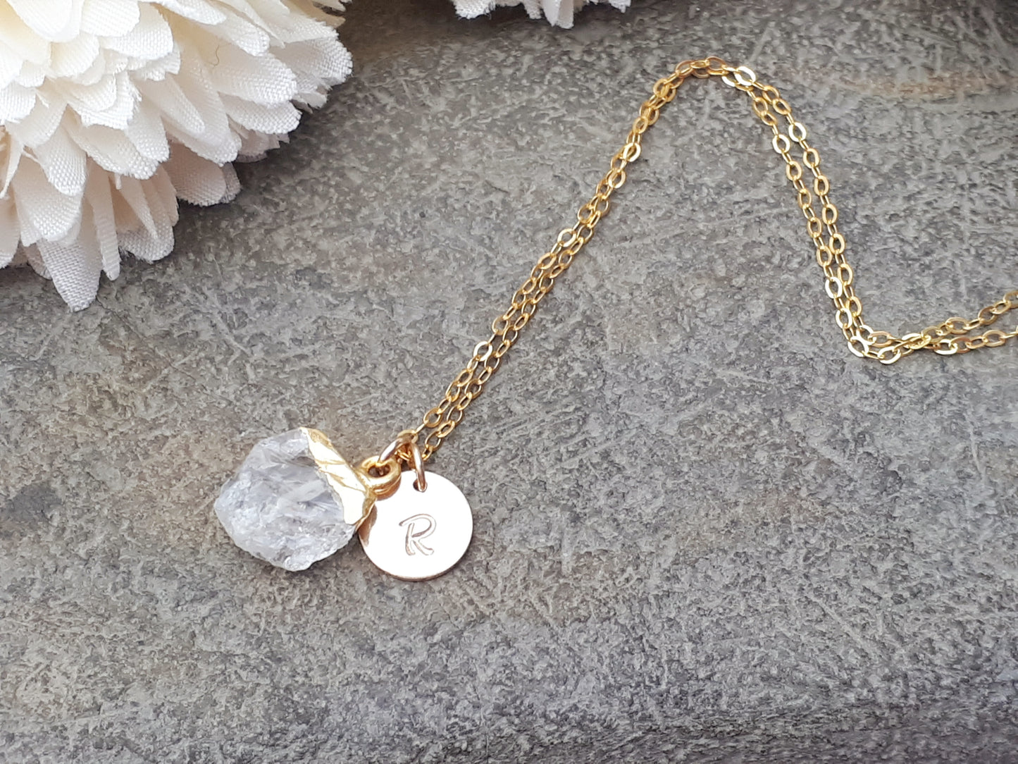 Personalised clear quartz necklace in gold.
