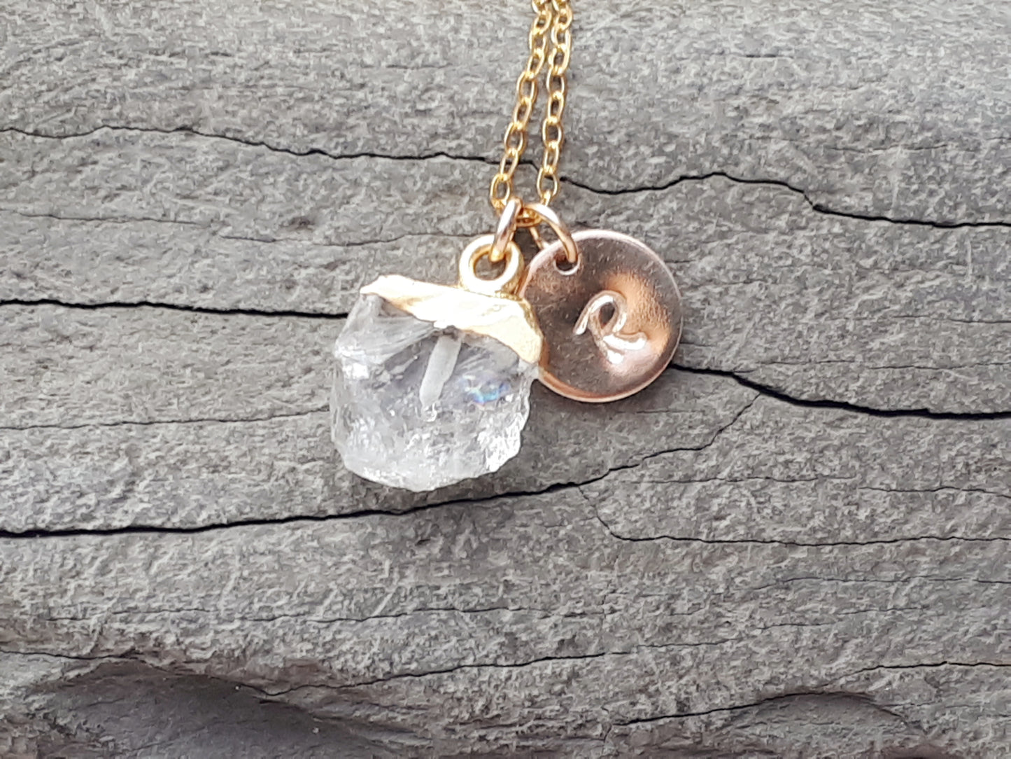 Personalised clear quartz necklace in gold.