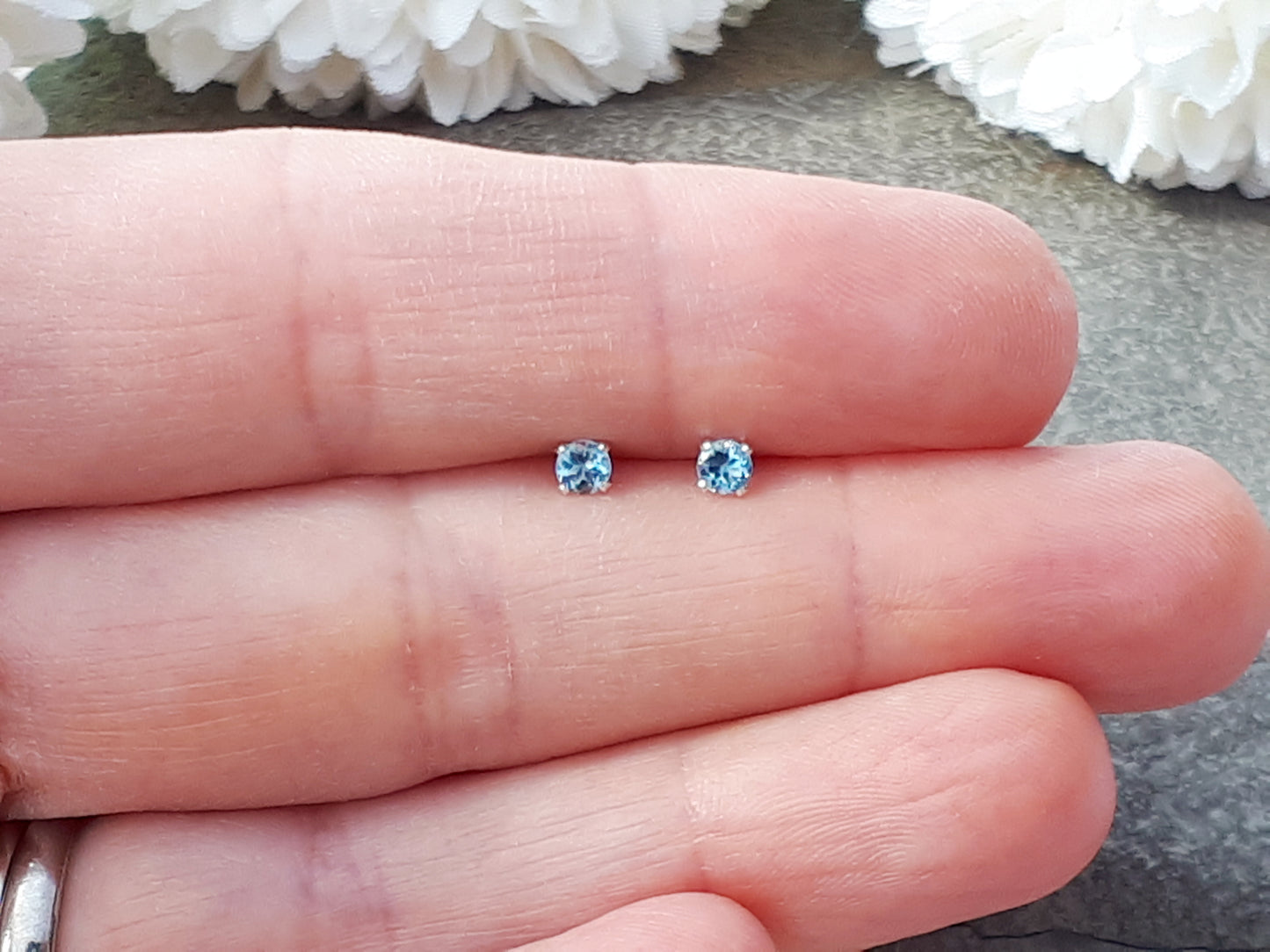 Aquamarine stud earrings in silver or gold.