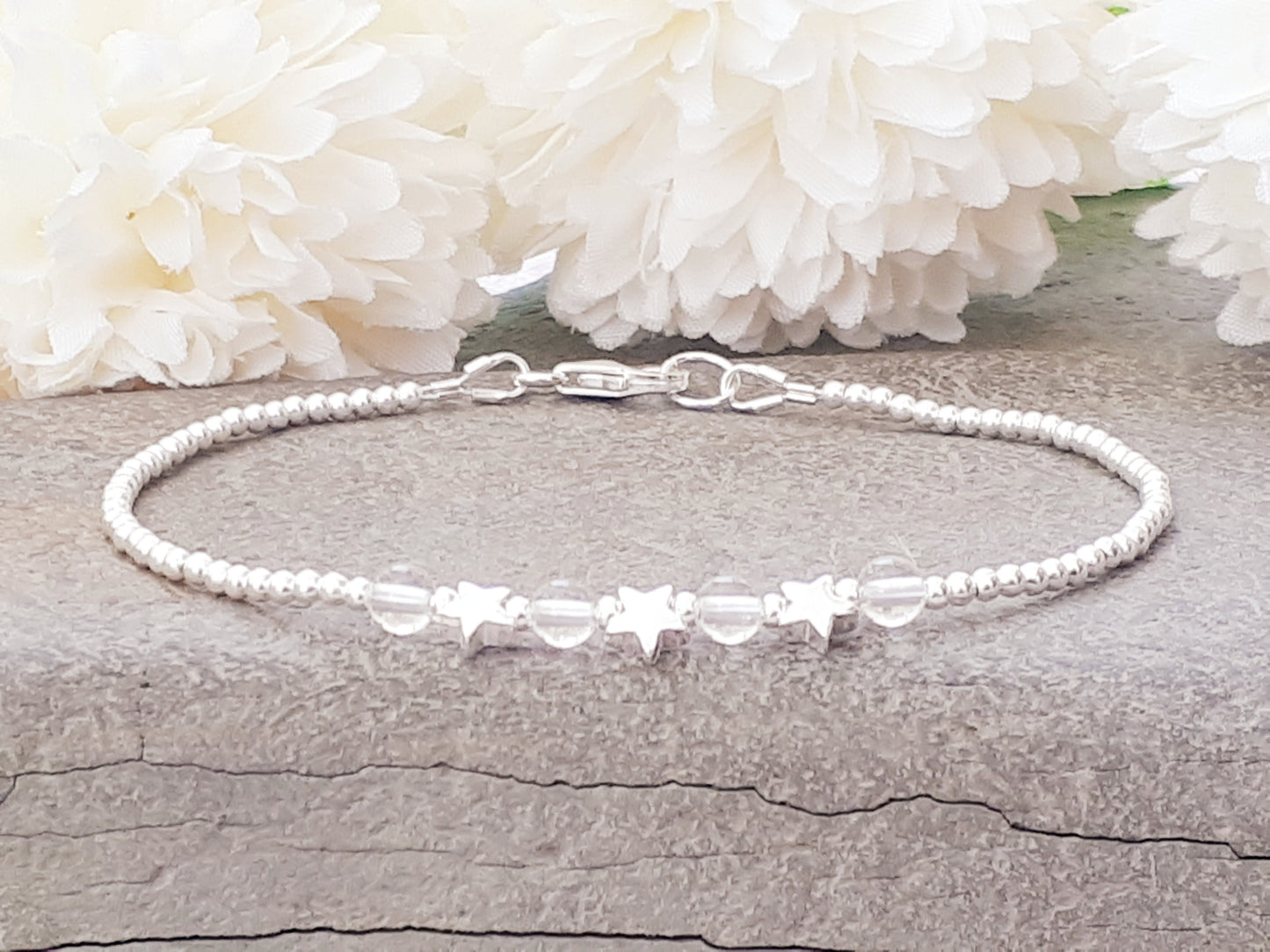 April birthstone star bracelet in silver.