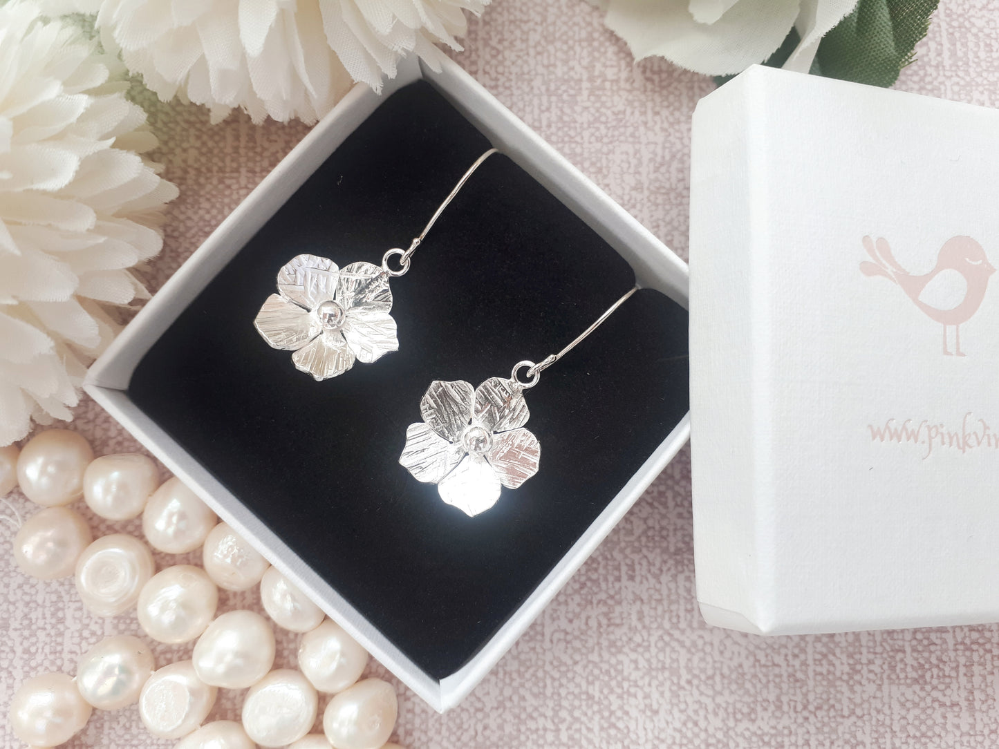 Flower drop earrings in sterling silver. Ready to ship.