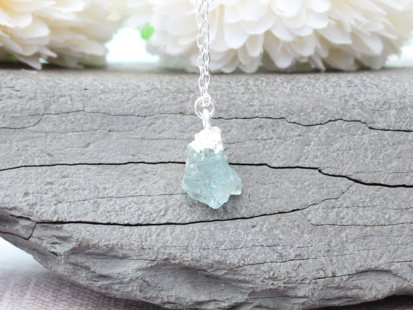 Raw aquamarine necklace in sterling silver.