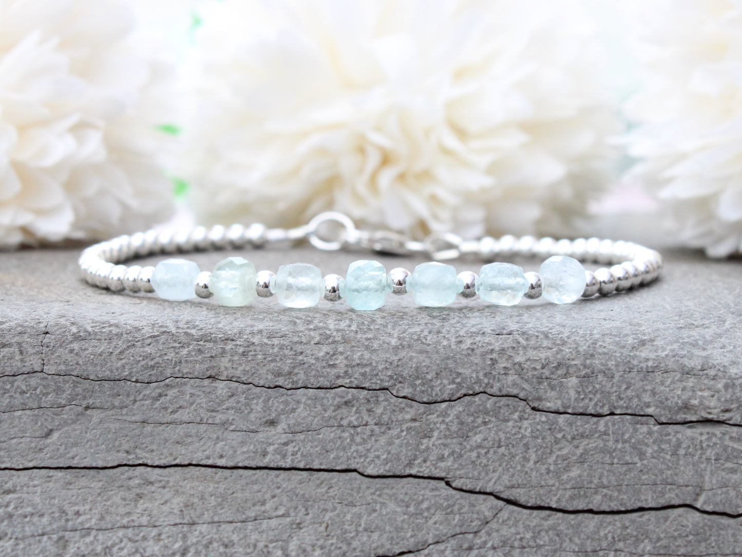 Aquamarine milestone bracelet in sterling silver.