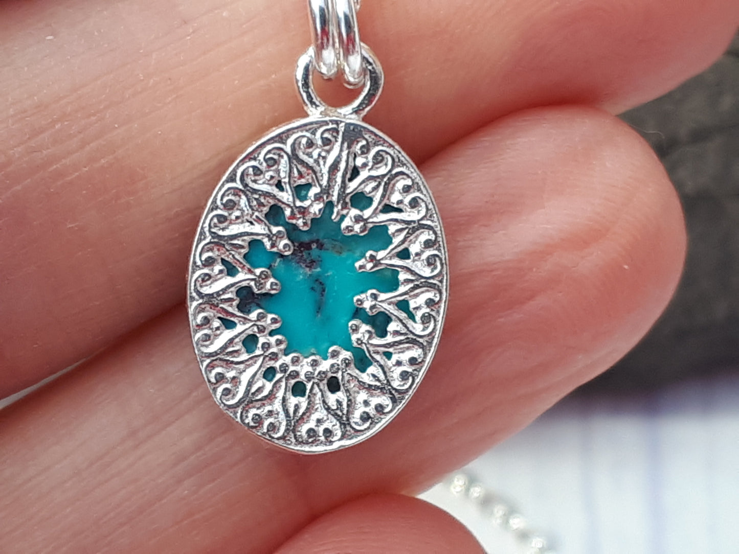 Turquoise pendant necklace in sterling silver.