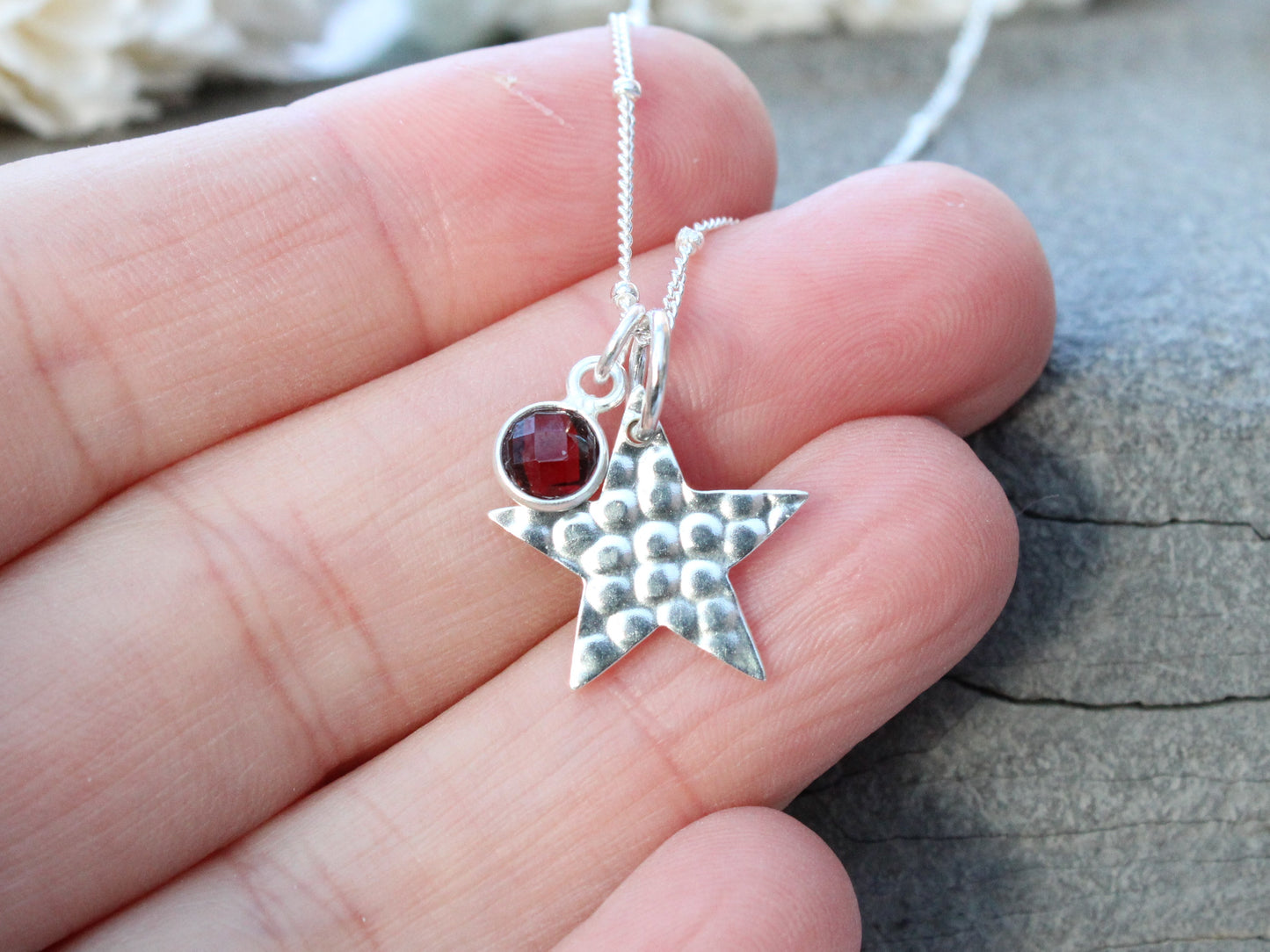 Hammered star necklace with optional birthstone.